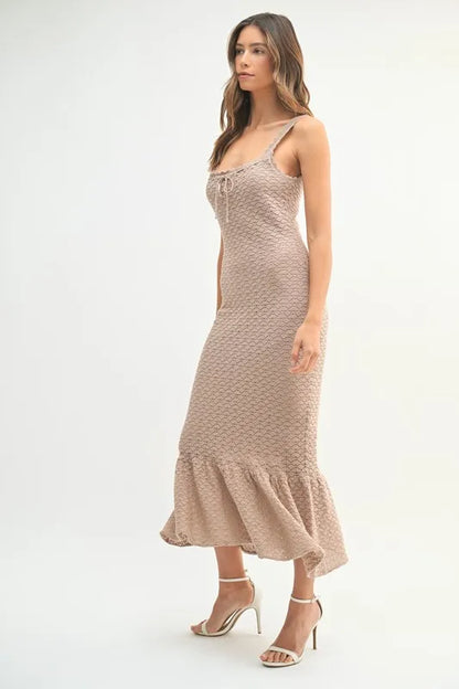 Beige crochet dress in mid-length with sleeveless cut and textured design

